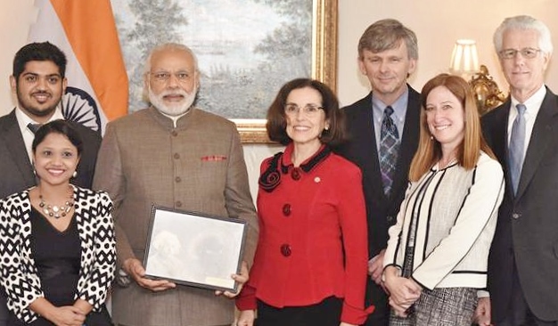 Nancy Aggarwal (left-front) and Karan Jani (left-back) with Indian PM Modi