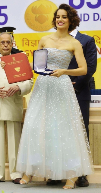 Best Actress awardee Kangana Ranaut at the 63rd National Film Awards Function, in New Delhi on May 3, 2016 (in the bcgd)President Pranab Mukherjee